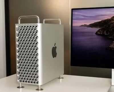 Apple Mac Studio computer displayed on a desk representing Apple’s new professional focus. Mac Pro tower next to Mac Studio showing the shift in Apple’s priority. Close-up of Apple Silicon chipset symbolizing the power behind Mac Studio. Creative professional workspace featuring Mac Studio setup. Side-by-side comparison mockup of Mac Pro and Mac Studio performance. Apple desktop lineup highlighting the transition from Mac Pro to Mac Studio. Concept image of Mac Studio being positioned as Apple’s main pro desktop machine.
