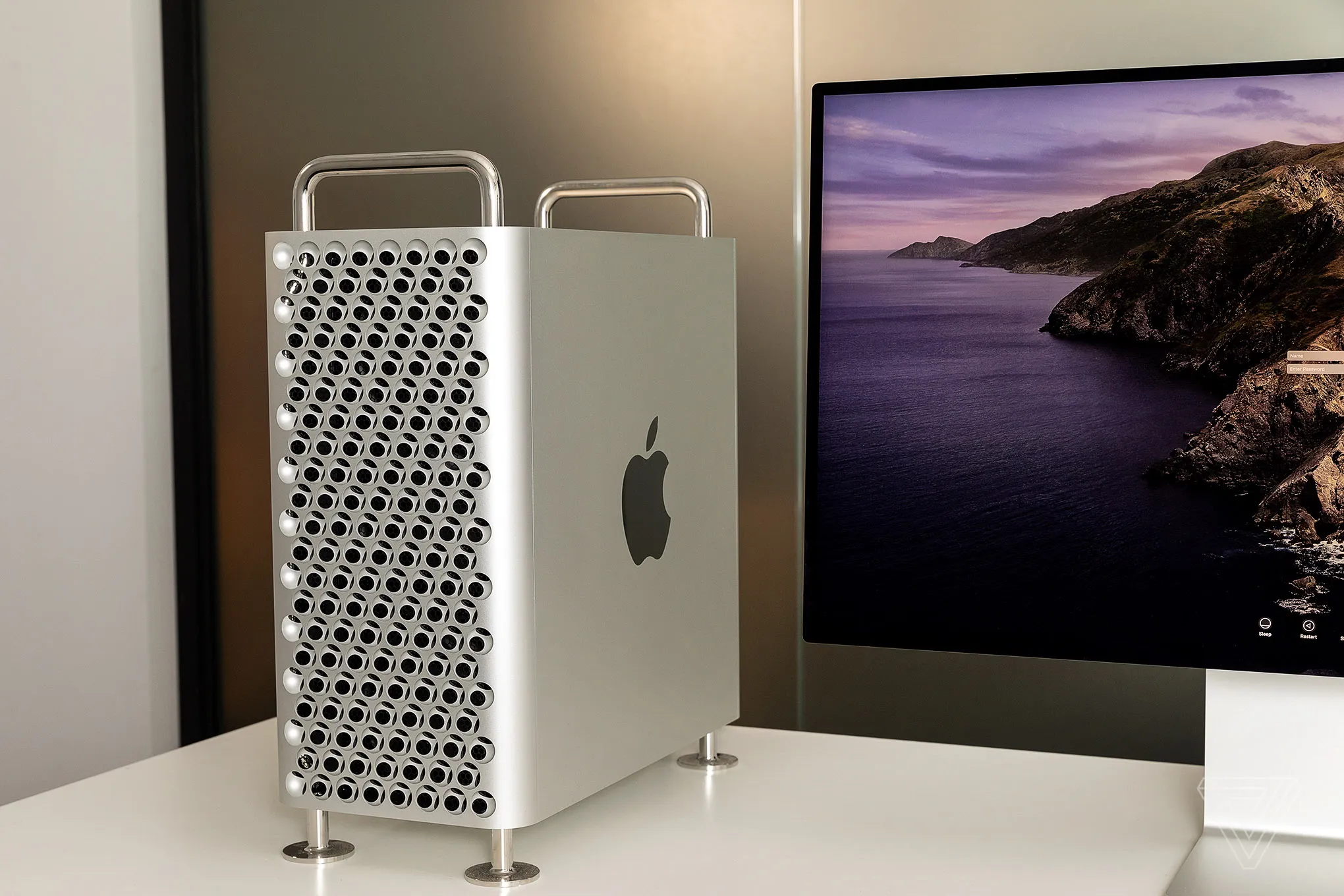 Apple Mac Studio computer displayed on a desk representing Apple’s new professional focus. Mac Pro tower next to Mac Studio showing the shift in Apple’s priority. Close-up of Apple Silicon chipset symbolizing the power behind Mac Studio. Creative professional workspace featuring Mac Studio setup. Side-by-side comparison mockup of Mac Pro and Mac Studio performance. Apple desktop lineup highlighting the transition from Mac Pro to Mac Studio. Concept image of Mac Studio being positioned as Apple’s main pro desktop machine.