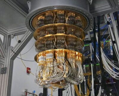 Quantum computing company showing strong Q3 financial performance chart. Researchers working with quantum hardware inside a high-tech laboratory. Business partners shaking hands after forming a quantum computing collaboration. Quantum processor chip displayed with advanced circuitry. Investor reviewing rising stock trends in the quantum computing sector. Hybrid quantum-classical computing system in operation. Engineers monitoring qubit stability on a quantum computer interface.