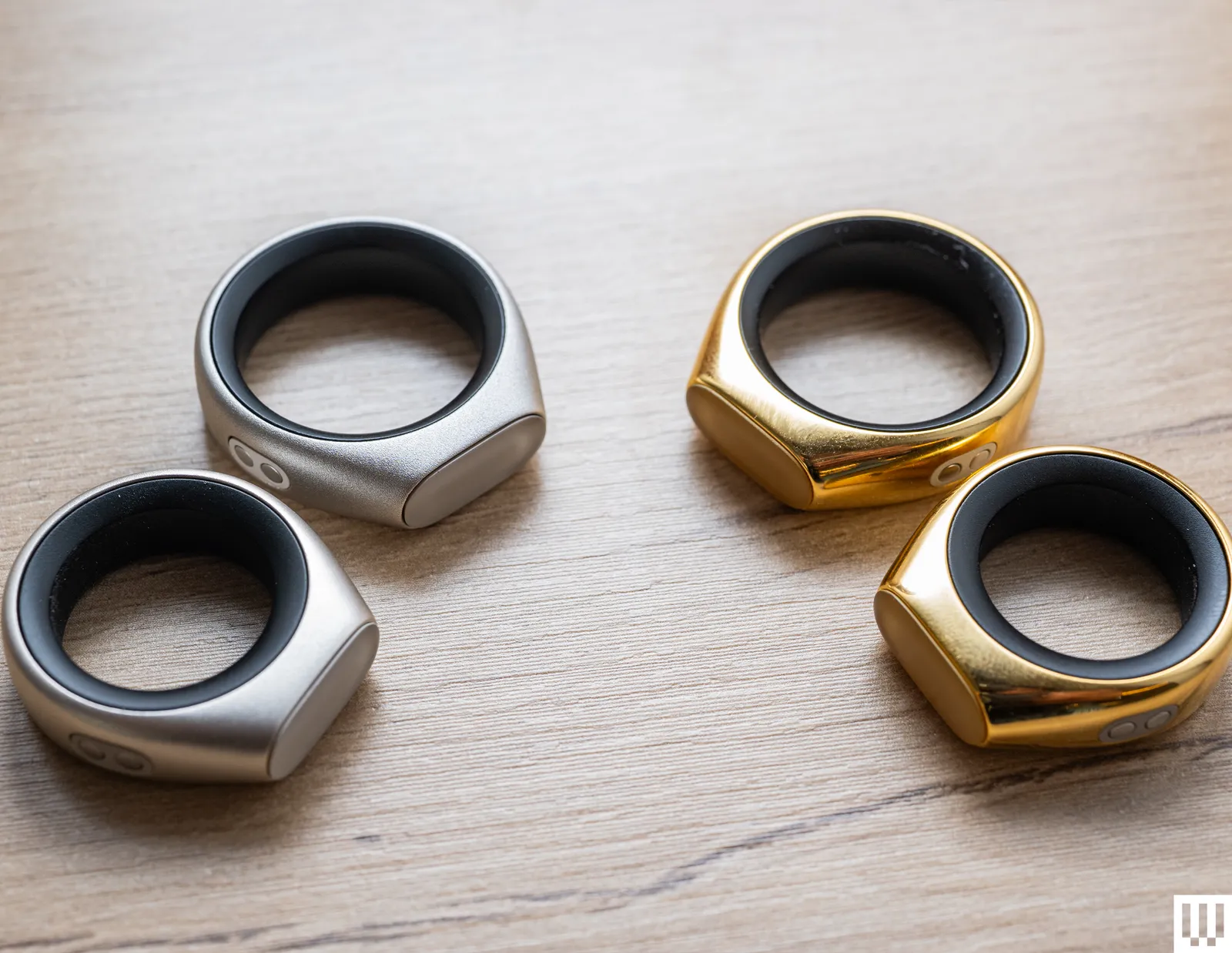 AI-Powered Smart Ring Close-Up – "Close-up of an AI-powered smart ring designed for voice input and thought organization." User Whispering to Smart Ring – "Person whispering into an AI smart ring to record thoughts privately and efficiently." Smart Ring Voice Recognition Technology – "Illustration showing how the smart ring captures whispers using advanced AI voice recognition." AI Thought Organization Interface – "Smartphone screen displaying organized notes and reminders synced from the AI smart ring." Gesture Control on Smart Ring – "User controlling smart ring functions through simple finger gestures and taps." Mindfulness and Productivity Tracking – "Dashboard view of the AI smart ring analyzing user mood and productivity trends." Future of Wearable AI Devices – "Concept image showcasing next-generation AI wearables, including smart rings and compact assistants."