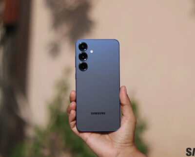 Samsung Galaxy S26 rumored slim design with sleek metal finish. Leaked Samsung Galaxy S26 concept showing ultra-thin profile. Magnetic Qi2 wireless charging feature on Samsung Galaxy S26 mock-up. Samsung Galaxy S26 camera module redesigned for modern look. Samsung Galaxy S26 AI tools interface on One UI 8.5 screen. Qi2 magnetic charger aligning perfectly with Galaxy S26 back panel. Comparison of Samsung Galaxy S26 and Galaxy S25 thickness.