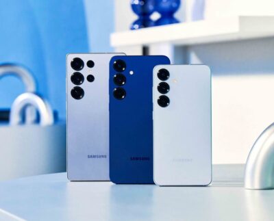 Samsung Galaxy S26 concept image representing rumored redesign influenced by iPhone 17 pricing. Comparison graphic of Galaxy S26 and upcoming iPhone 17 highlighting market competition. Samsung smartphone mockup showing potential design changes for the Galaxy S26. Apple iPhone 17 promotional concept illustrating Apple’s price-holding strategy. Side-by-side render of Samsung and Apple flagship phones showcasing design evolution. Illustration of smartphone industry trends triggered by Apple and Samsung rivalry. Concept design of the Galaxy S26 with updated camera and chassis redesign.